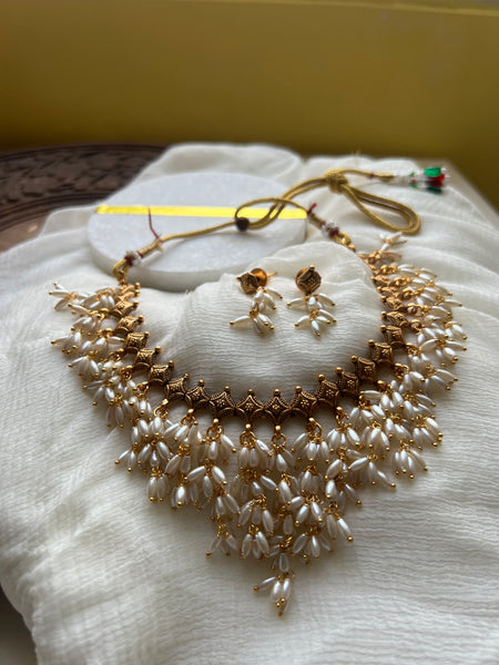 Antique rice pearl necklace with studs