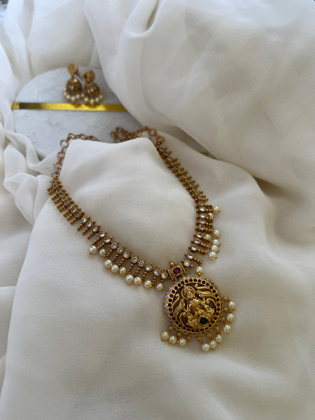 Lakshmi Attigai with small jhumkas