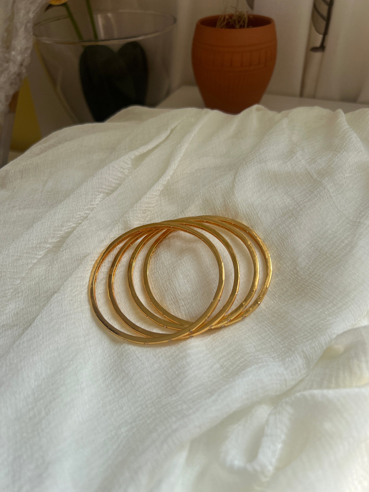 Stone studded gold bangles