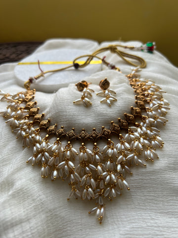 Antique rice pearl necklace with studs