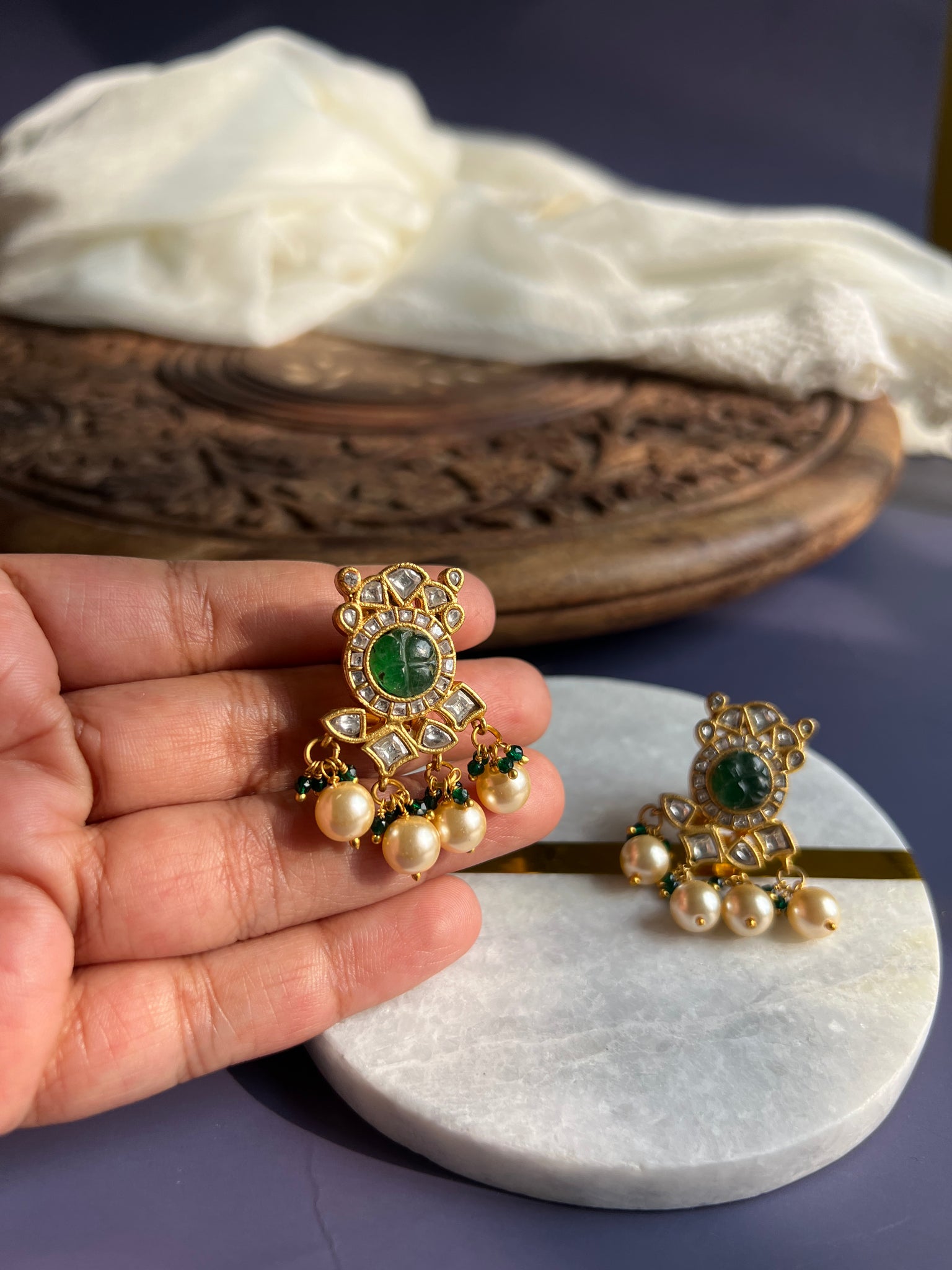 Carved stone studs
