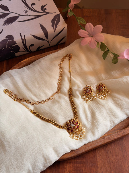 Ruby lotus necklace with studs