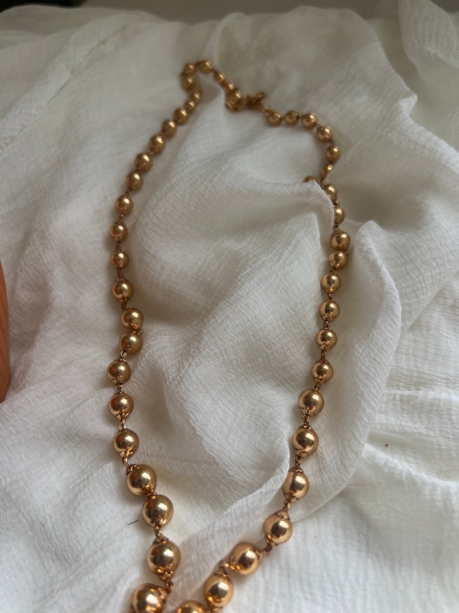 Gold bead maala