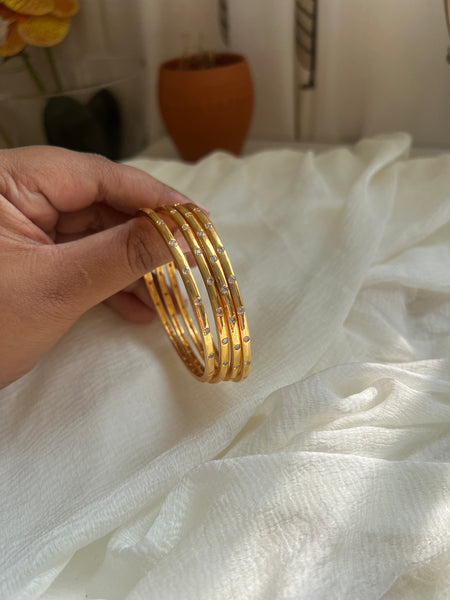 Stone studded gold bangles