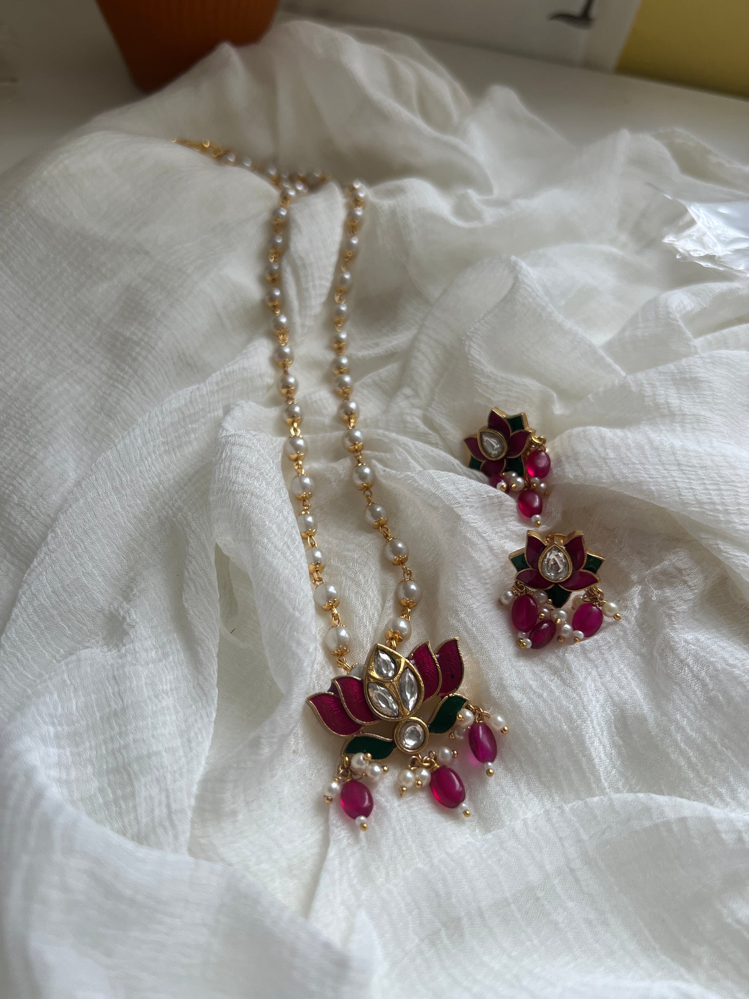 Enamel lotus pendant maala  with studs