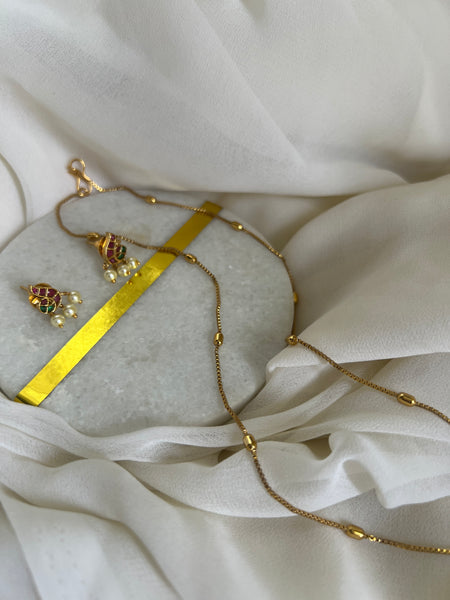 Kemp peacock pendant chain with studs