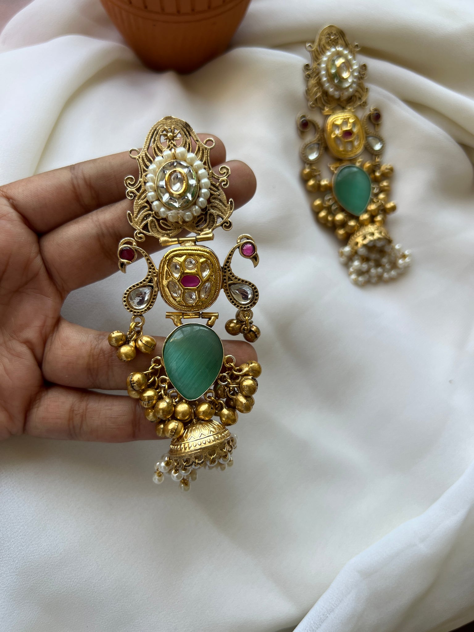 Kundan mayoora jumbo jhumkas