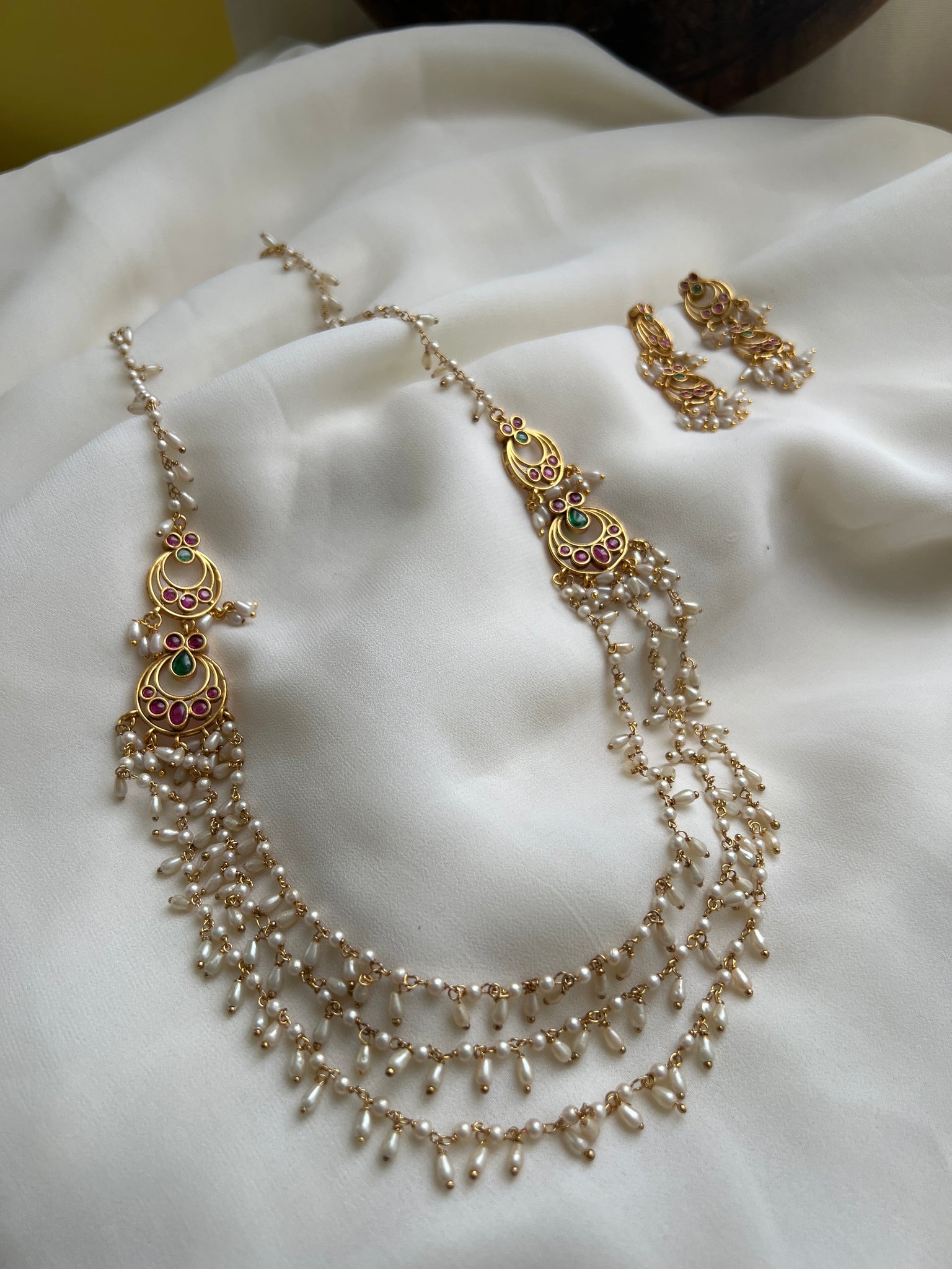 Guttapusalu layers haram with earrings