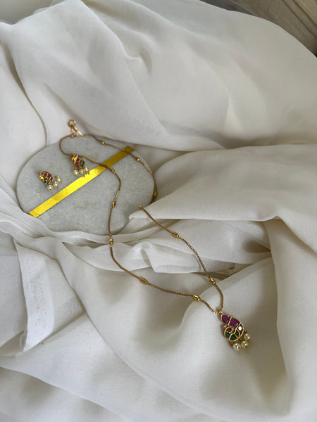 Kemp peacock pendant chain with studs