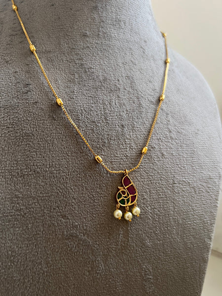 Kemp peacock pendant chain with studs