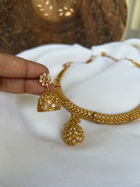 Stiff designer necklace with Jhumkas