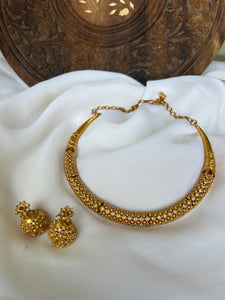Stiff designer necklace with Jhumkas