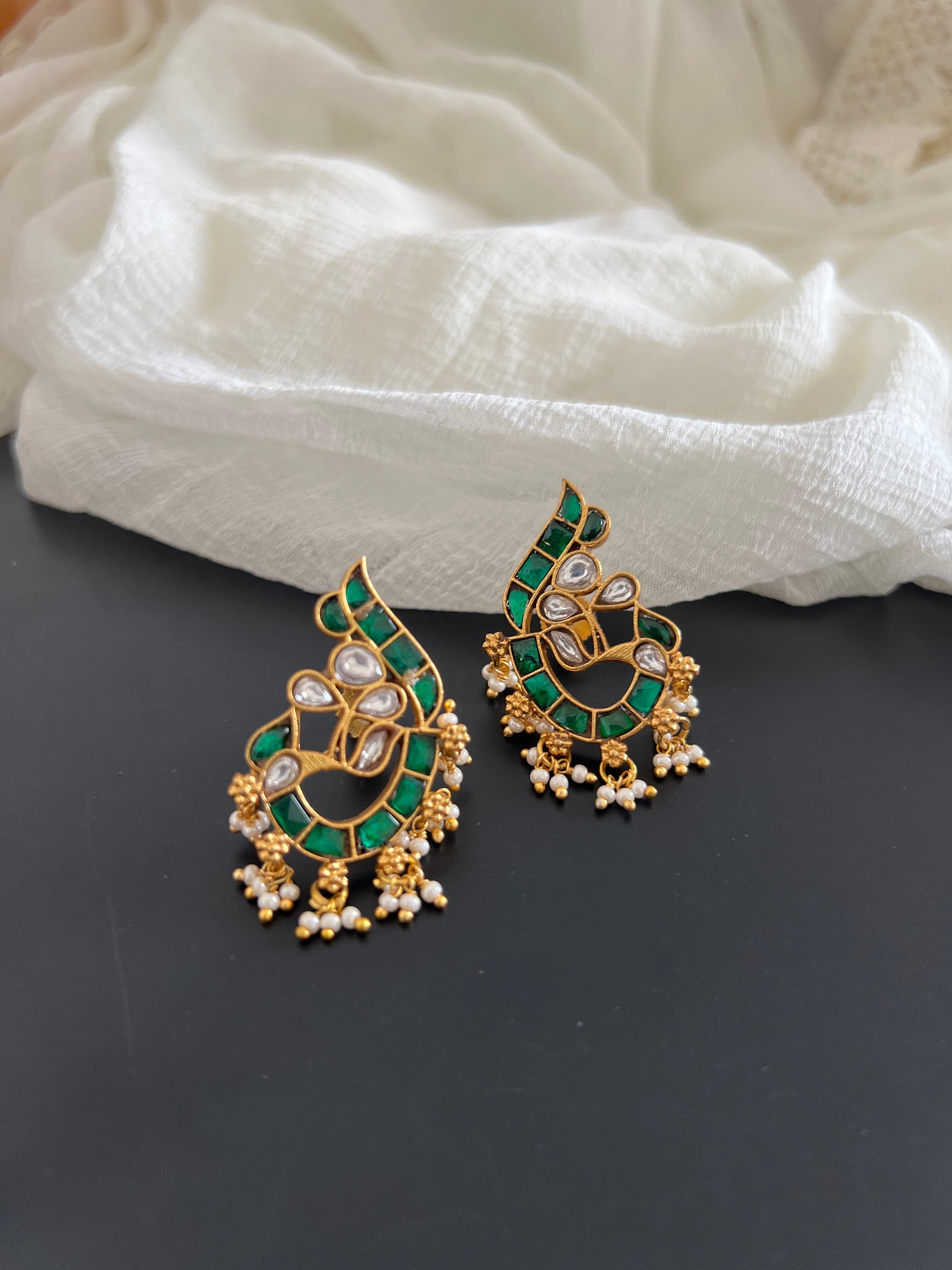 Emerald peacock studs