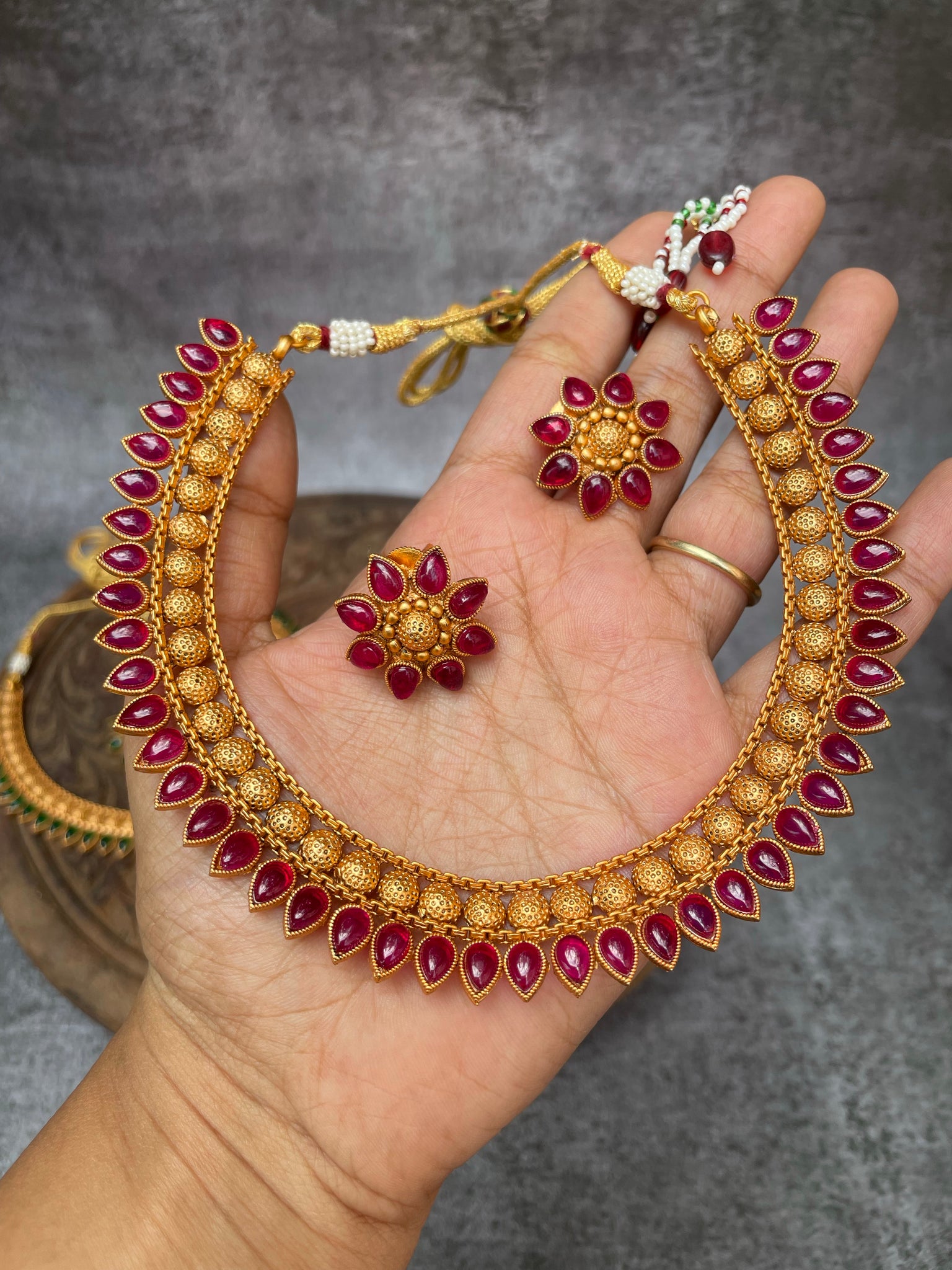 Kemp tear drop necklace with flower studs
