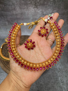 Kemp tear drop necklace with flower studs