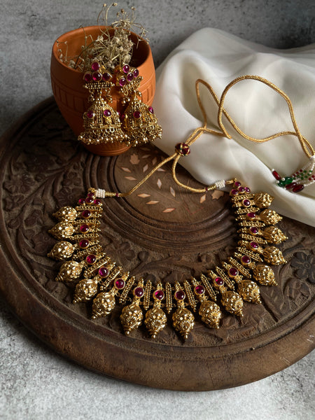 Ruby antique gold like necklace with Jhumkas