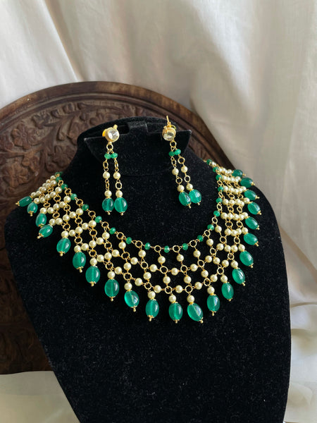 Jaali worked bead necklace with Kundan studded earrings