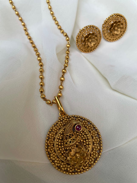 Golden peacock with kemp stone and studs in a maala