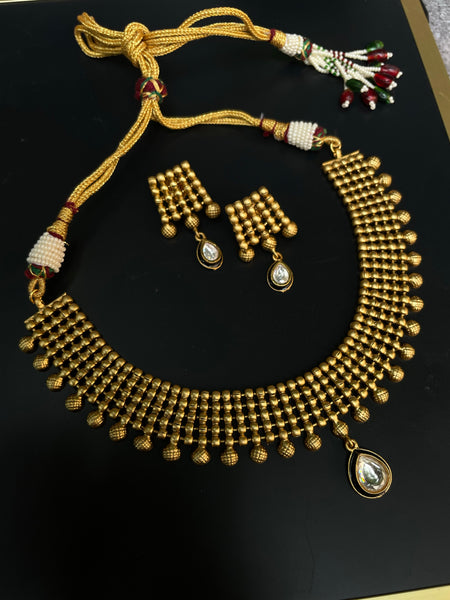 Antique designer necklace with studs