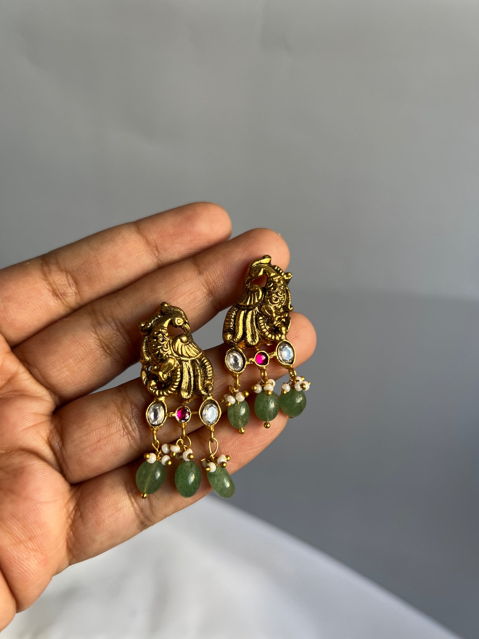 Nagas peacock kunds studs