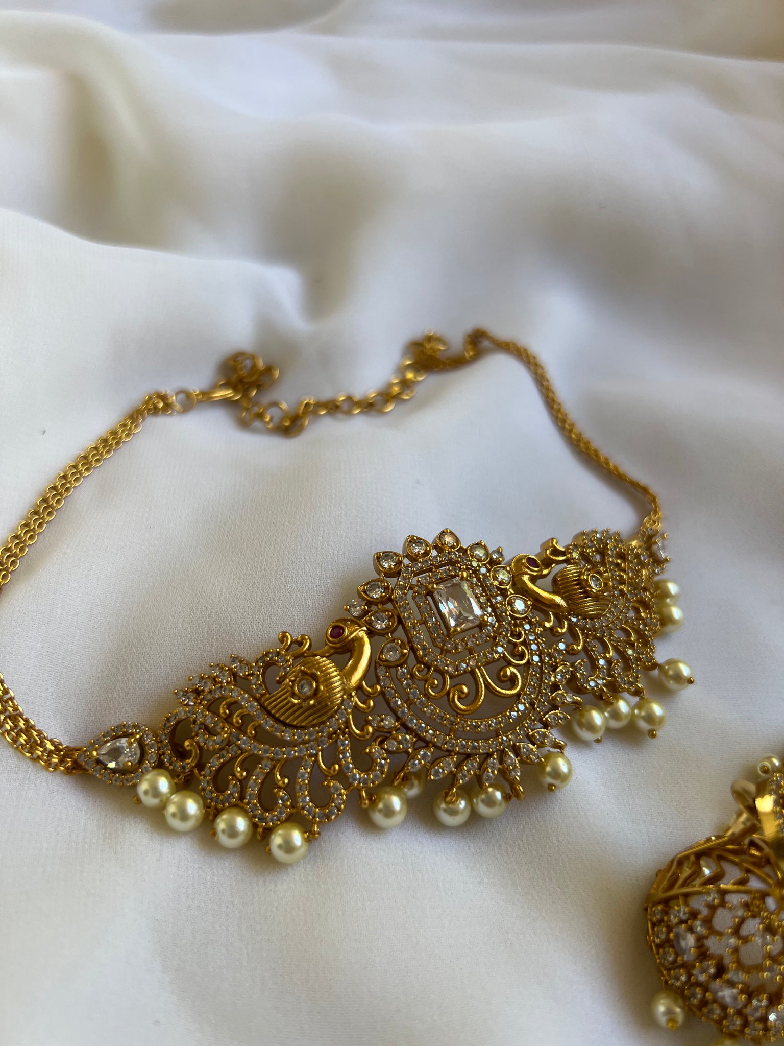 Ad stone regal choker with jhumkas