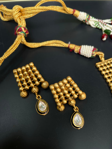 Antique designer necklace with studs