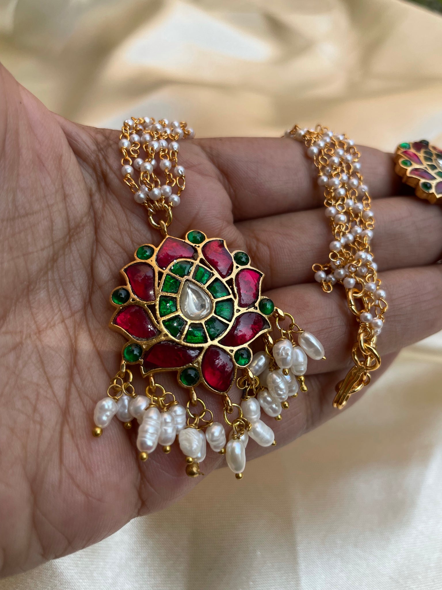 Kundan lotus pendant with cluster Pearl maala and studs