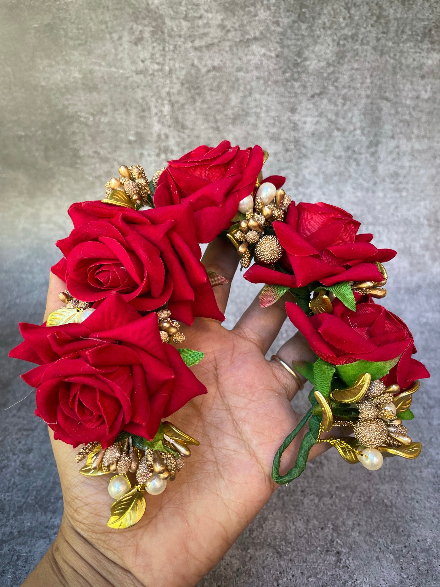 Big rose with golden leaf and pearls