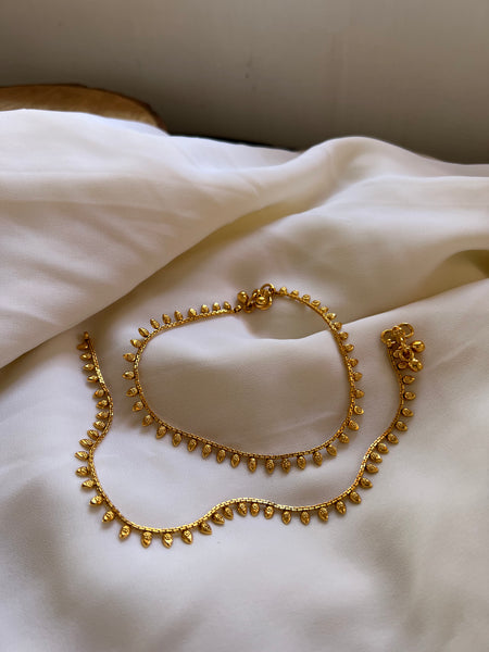 Golden tear drop anklets