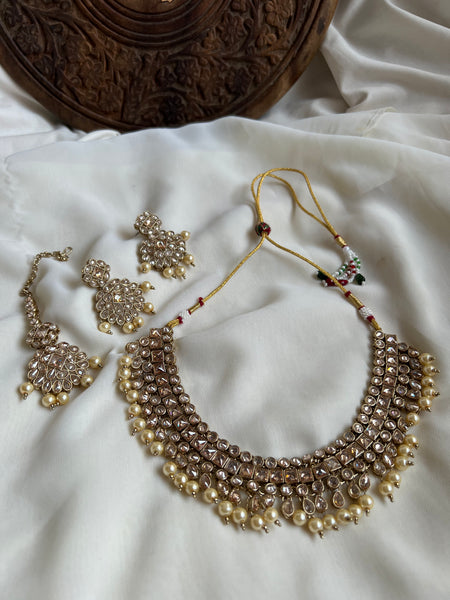 Bridal polki like necklace with earrings and tika