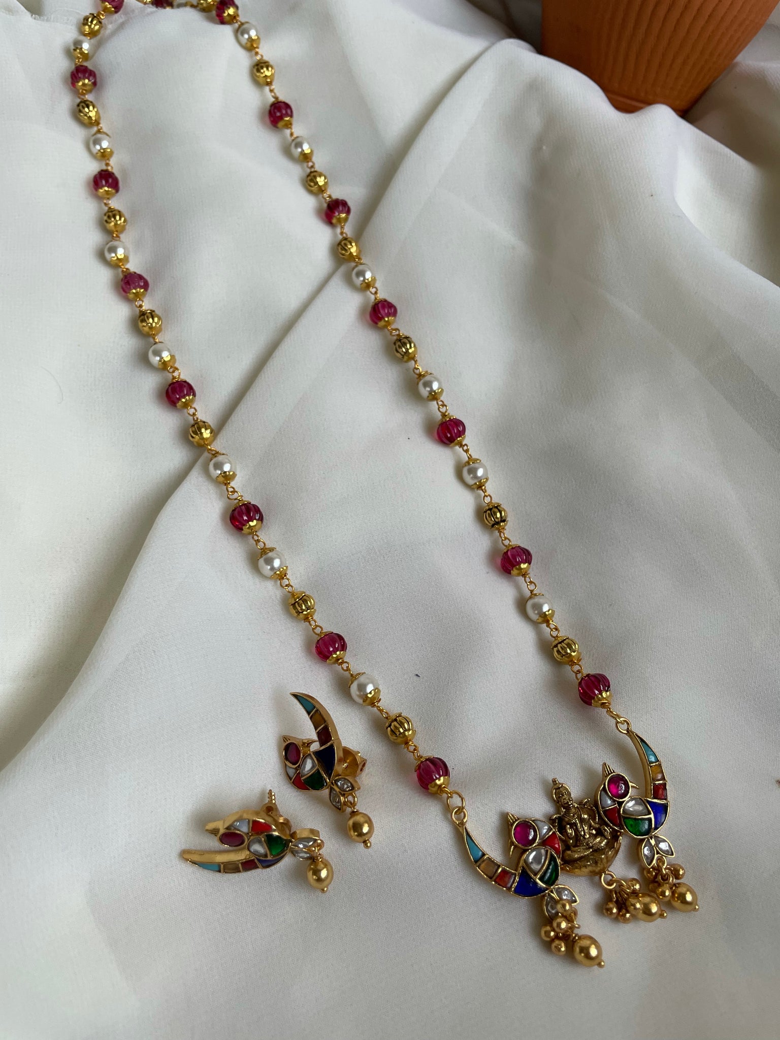 Kundan bird Lakshmi pendant in maala with studs