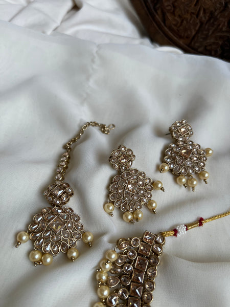 Bridal polki like necklace with earrings and tika