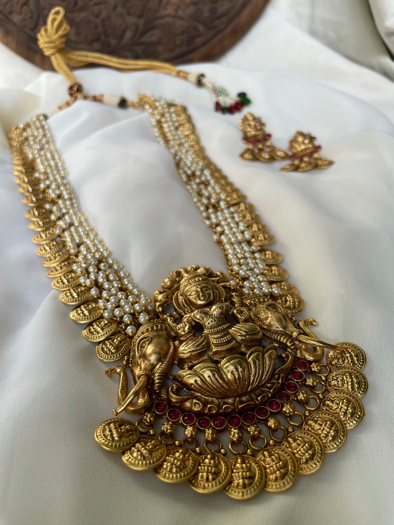 Nagas coin haram with Pearl cluster work