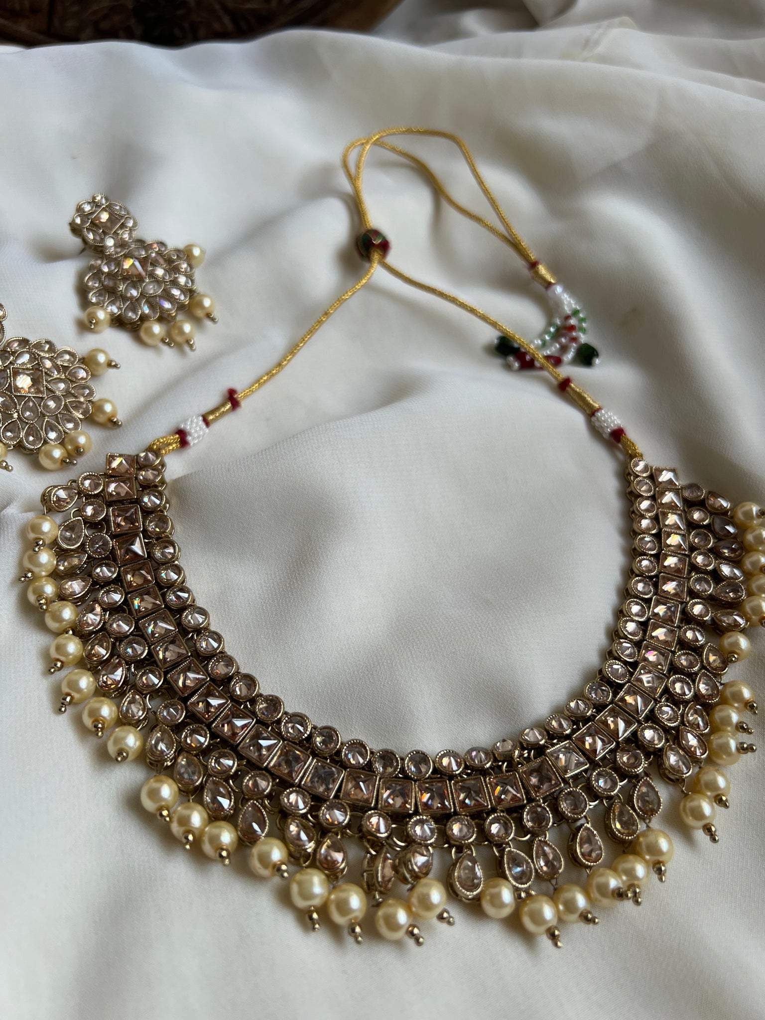 Bridal polki like necklace with earrings and tika