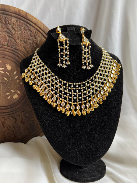 Ahmedabadi Kundan Pearl Jaali choker with long earrings