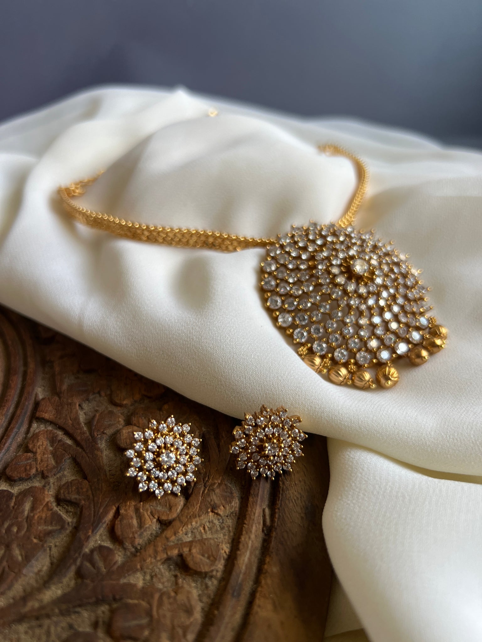 White stone pendant necklace with studs