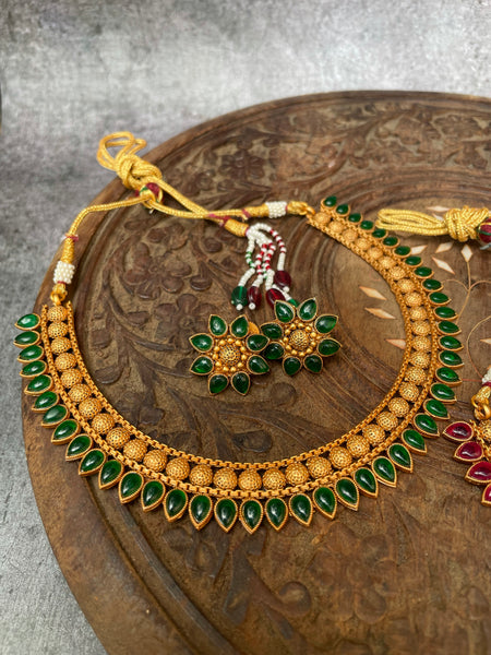 Kemp tear drop necklace with flower studs
