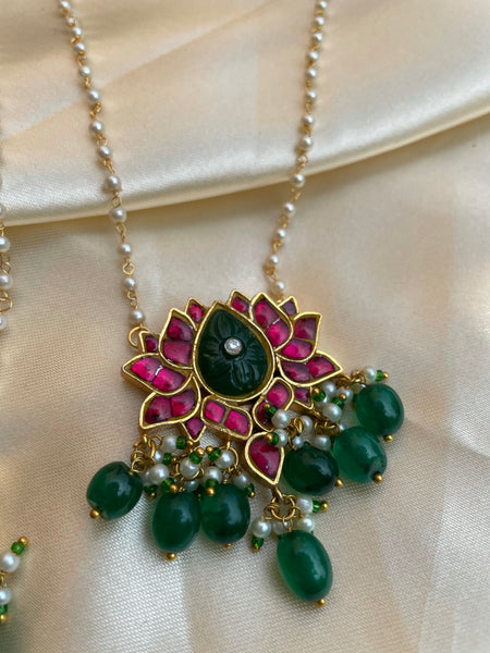 Kundan lotus pendant with carved stone