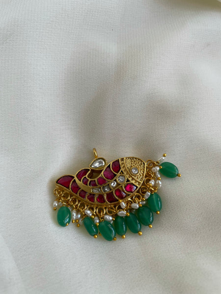 Reversible fish pendant with beads
