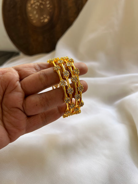 Ad flower golden bangles set of 4