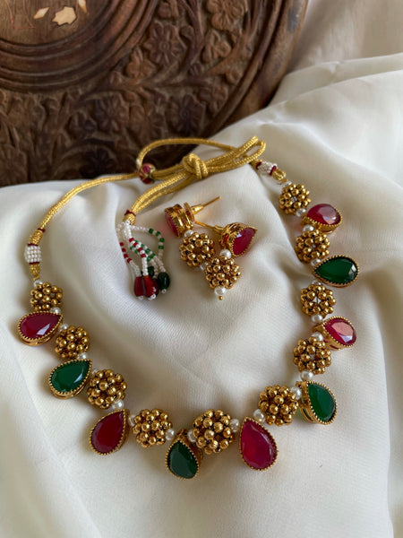 Oval stone necklace with studs