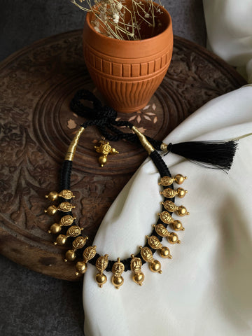 Temple style  thread necklace with studs