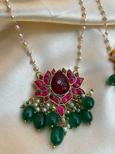 Kundan lotus pendant with carved stone