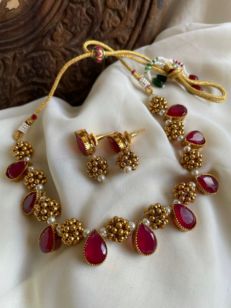 Oval stone necklace with studs