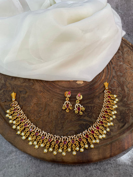 Ruby tear drop Ad necklace with studs
