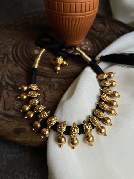Temple style  thread necklace with studs