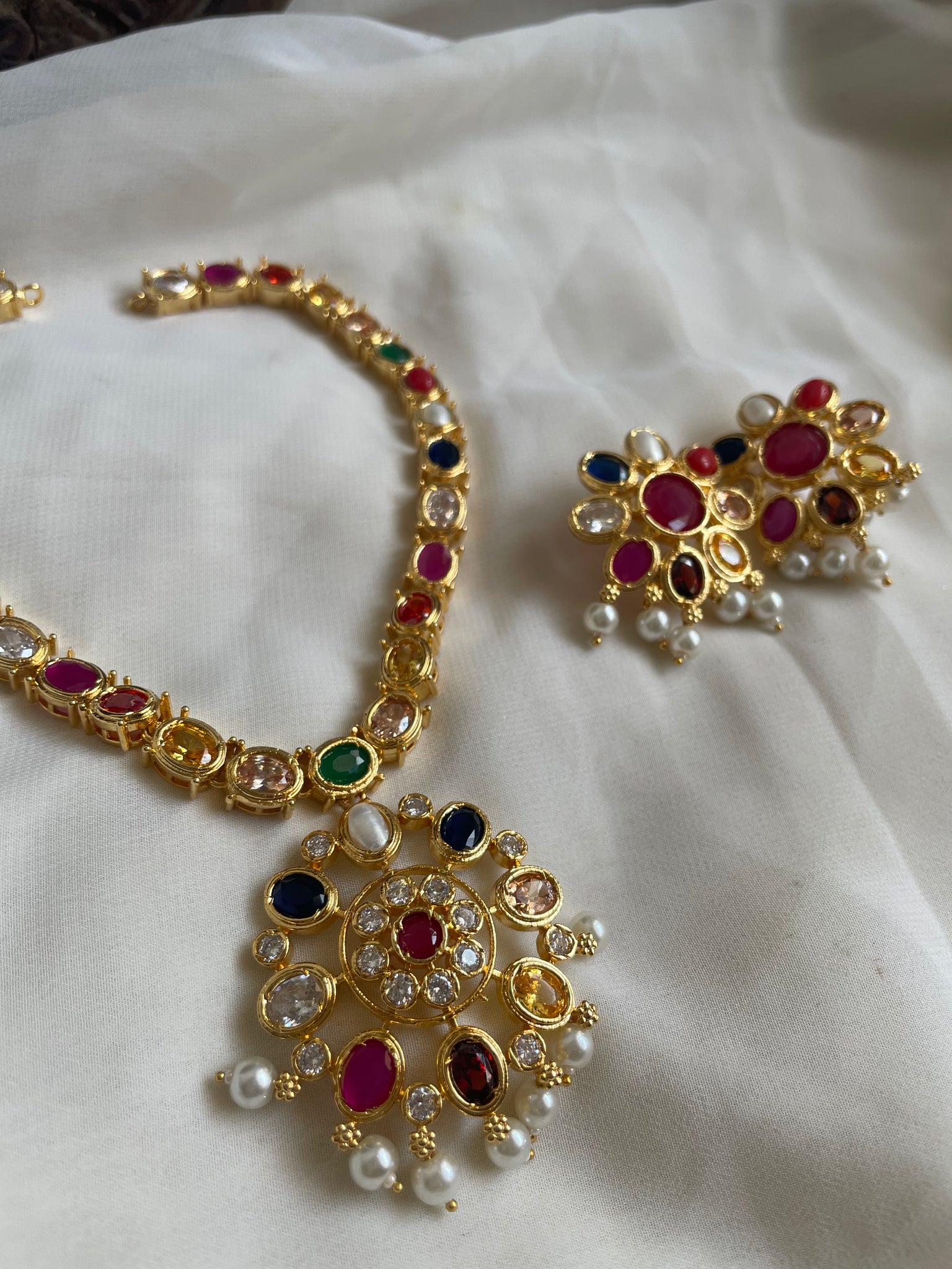 AD stone Navaratna maala with studs