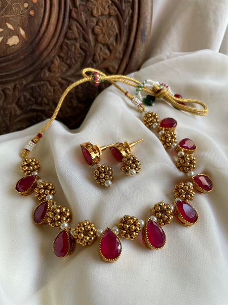 Oval stone necklace with studs