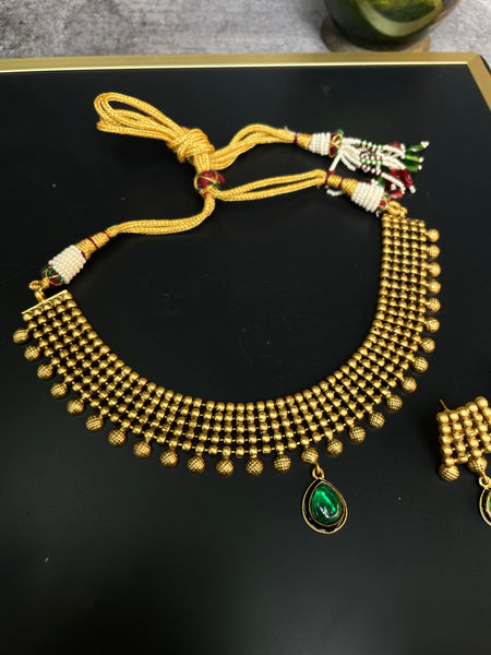 Antique designer necklace with studs