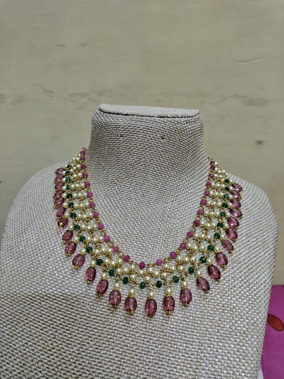 Jaali worked bead necklace with Kundan studded earrings